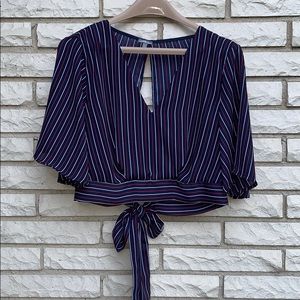 Charlotte Russe cropped, slit, tie back shirt